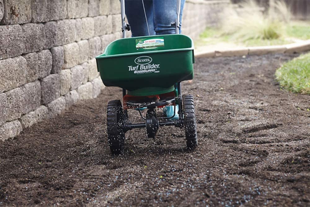 Scotts Turf Builder Edgeguard Mini Broadcast Spreader รถเข็นโรยปุ๋ย / เมล็ดพืชสก๊อตส์